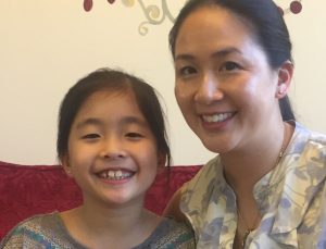 happy-child-and-mother-ears-pierced